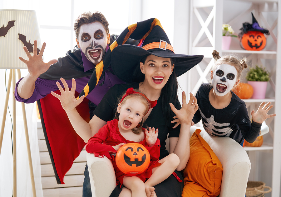 Happy family in Halloween party